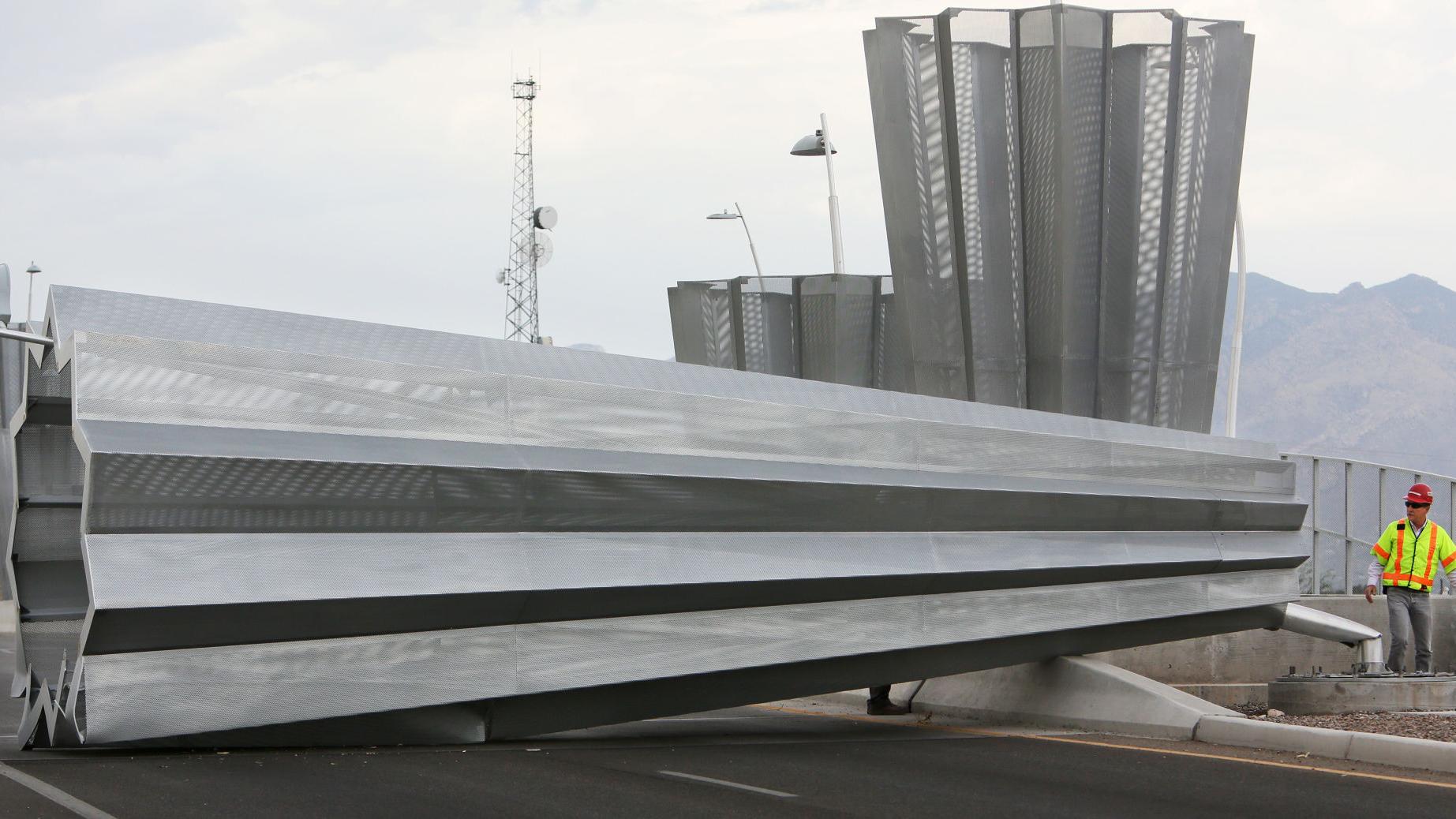 Tucson's monsoon roars to life with rain, strong winds that topple metal structure